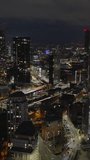Vertical Video of Manchester, Vertical Aerial View Shot, night, evening