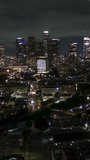 Vertical Video of Los Angeles LA, Vertical Aerial View Shot, night, evening