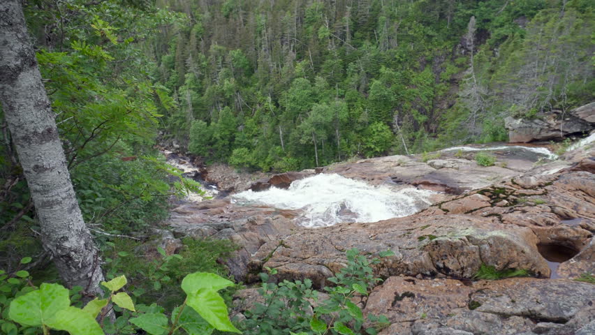 Southeast Brook Falls in Gros Morne National Park, a Canadian national park and World Heritage Site in Newfoundland. Stream flows over billion-year-old ridge of resistant granite and plunges 40 metres