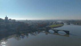 Drone flies over Avignon city in France. Pont Saint Benezet and Chateauneuf du Pape, next to Rhone river