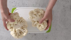 The chef devided cauliflower into florets