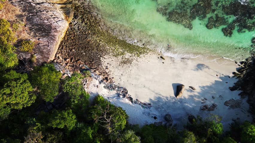 rocks lonely sandy beach koh lipe island thailand. Perfect aerial top view flight vertical bird's eye view drone
4k footage Royalty-Free Stock Footage #3451191563
