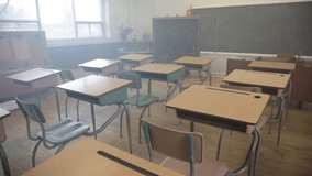 Empty classroom steady shot walking through desks - Powered by Shutterstock - Get 15% off with code: PIKWIZARD15