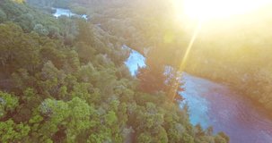 NEW ZEALAND – MARCH 2016 : Aerial shot over Huka Falls at sunset with Waikato River in view