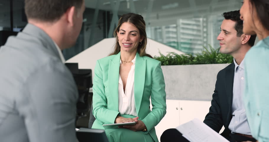 Pretty Hispanic female HR manager shake hand applicant after job interview. Multiethnic businesspeople, client and company management make deal, conclude agreement, handshake, express regard and trust Royalty-Free Stock Footage #3451243937