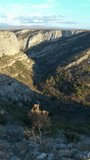 AERIAL: Scenic flying over gorgeous and protected karst formation Cikola Canyon. High angle view of steep and deep river Cikola canyon. Breathtaking limestone landscape phenomenon in Central Dalmatia.