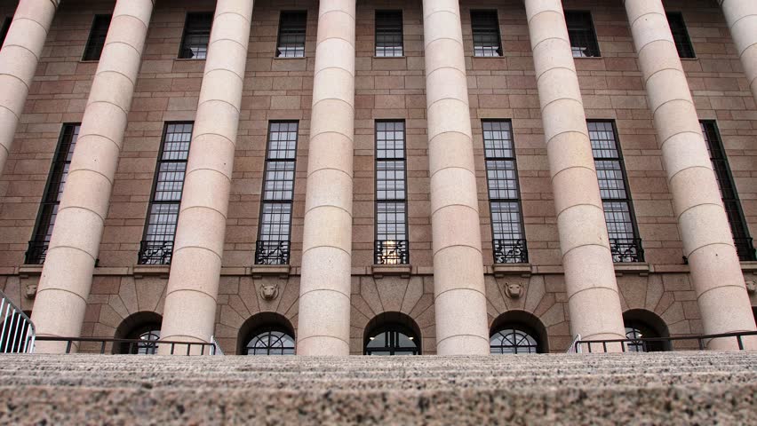 Classical architecture of Helsinki Parliament House, grand columns, daytime, no people, wide shot slow zoom in