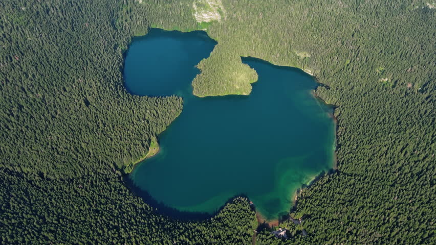 Aerial top view of famous Black Lake in mountain Durmitor park at summer, Montenegro, 4k