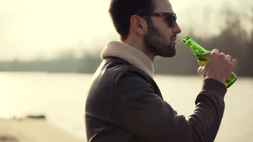 Cool Refreshment Wheat 
Beer. Beer Lover Leisure Time. Weekend Chill Drinking Beer. Cool Refreshment Serene Atmosphere. Pale Ale Beer Lover Chilled Beverages Tranquil Retreat. Calm Sunset Celebration Royalty-Free Stock Footage #3451708125