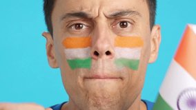 Man with indian national flag upset with a referee