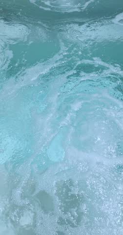 4k Vertical Fresh Spa Hot Tub Pool Water Abstract Background.