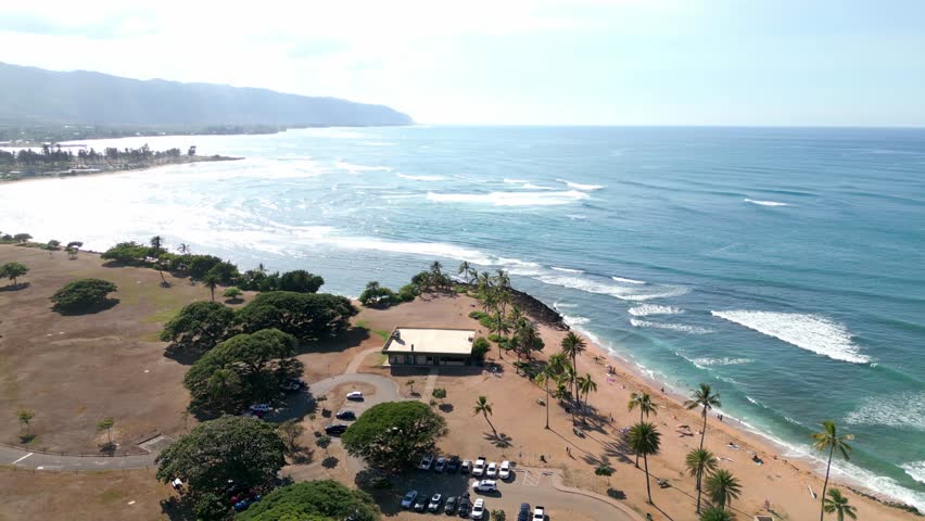 Ocean Waves Splashing At Beach In The Island Of Oahu In Hawaii, USA. aerial shot