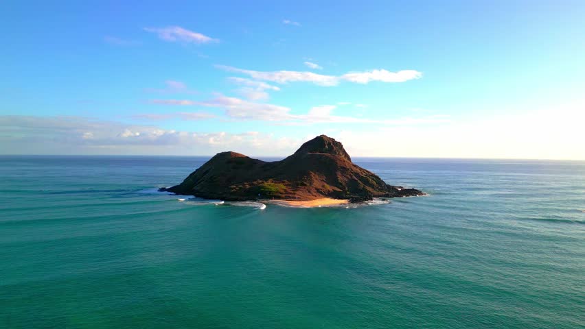 Mokulua Islet Off The Windward Coast Of Oahu In Hawaii, USA. wide drone shot