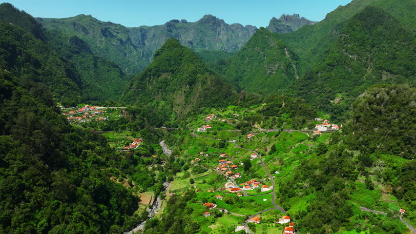 Small Town High in the Mountains, Village In Green Forest At Summer Season, Spectacular Tropical Nature, Beautiful Landscape from Drone of Popular Tourist Destination. Madeira, Portugal.