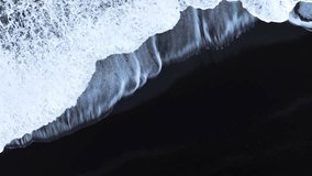 Abstract pattern in nature, Aerial view of black sand volcanic beach with crashing waves, Surreal nature drawing, Serene and tranquil landscape, Famous landmark of Iceland - Powered by Shutterstock - Get 15% off with code: PIKWIZARD15