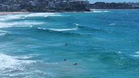 Sydney, Australia Aerial view of surfers at Shelly Beach in the capital of the state of New South Wales in Australia