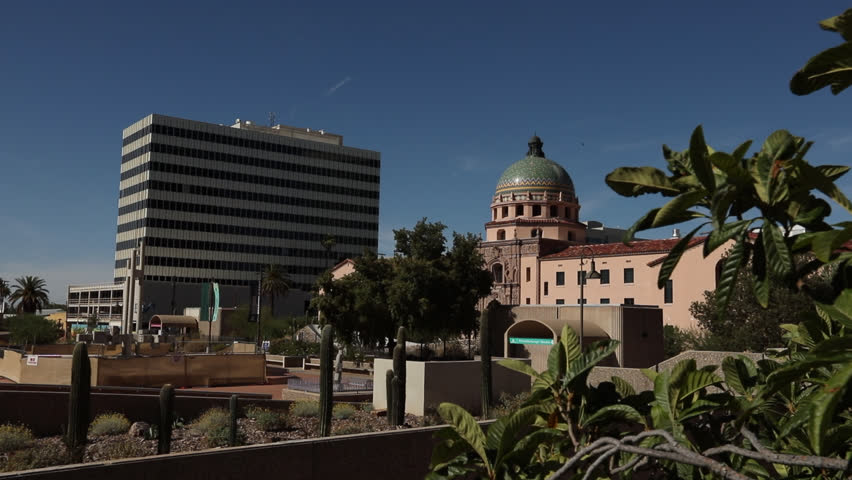 Afternoon light sines on the Pima County Historic Courthouse and downtown skyline of Tucson, Arizona, USA.