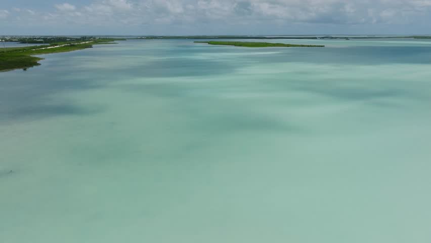 Aerial orbiting view showing the turquoise waters of the Florida Keys Royalty-Free Stock Footage #3451993153