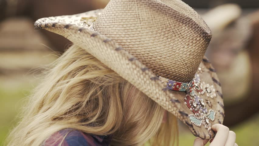 Pretty Texas cowgirl wearing a hat-4k_Ranch_Horse