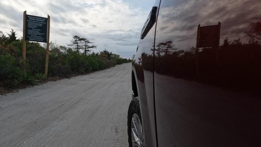 Driving on the beach in a pickup