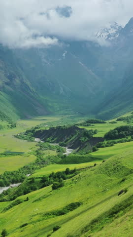 Aerial view of summer canyon in Caucasus montains. Vertical video