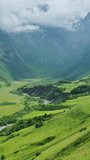 Aerial view of summer canyon in Caucasus montains. Vertical video