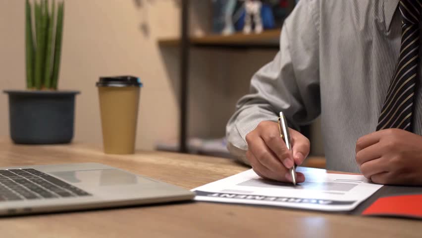Business contract signing A Woman Signing The Document Judge giving document with contract to woman to sign in financial agreement closeup of lawyer,