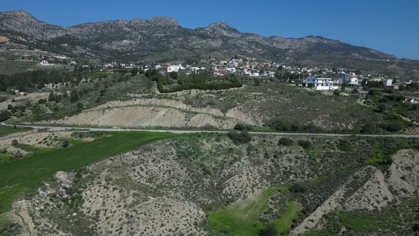 andscape. Mountains, hills of Cyprus. The road with the car. static frame