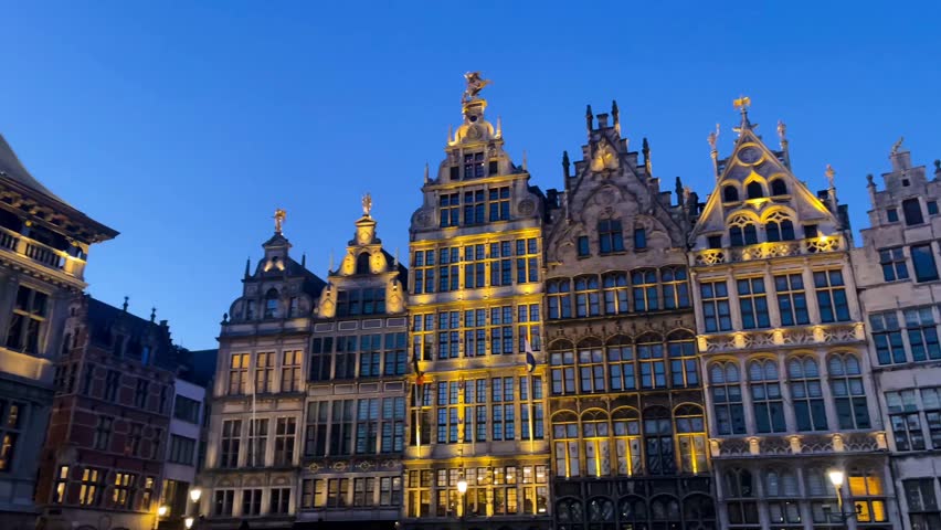 The Grote Markt of Antwerp, Belgium, beautiful old town square with evening lights, slow motion video