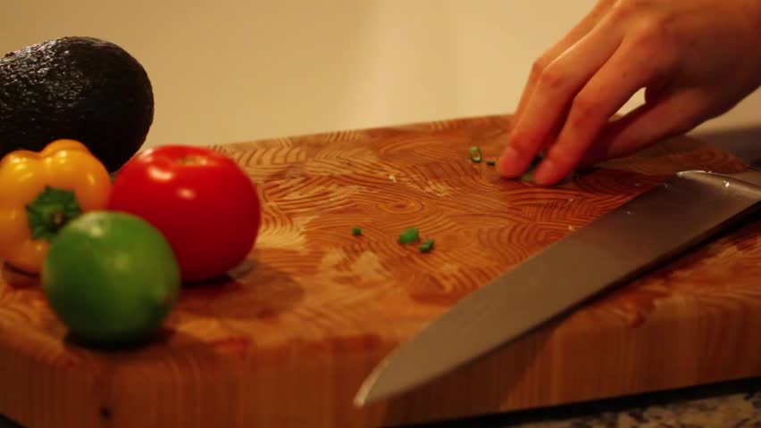 slicing vegetables of a dinner salad