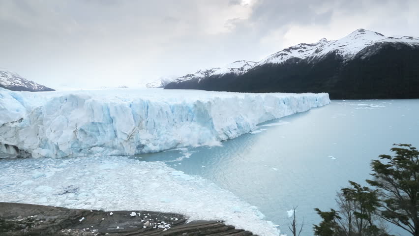Ecology disaster impacted by wild fires, air pollution, plastic crisis, oil production, deforestation drought. Zoom out melting glacier ice collapsing into ocean. Global warming climate change collage Royalty-Free Stock Footage #3452548091