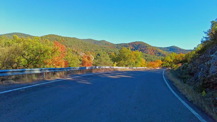 Driving through Foz de Arbayun canyon of Salazar River in the Pyrenees in Navarre Autonomous Community of Spain, Europe
