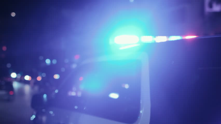 Blurred police car emergency vehicle lights in busy city street, loop  | Shutterstock HD Video #34526887
