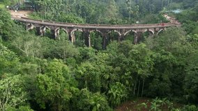 A beautiful nine-arch bridge near the city of Ella in Sri Lanka. Top view, aerial video filming.