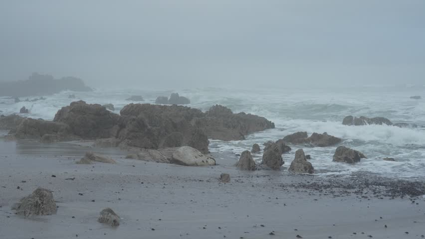 Grey, misty weather along the rocky Hermanus coastline. Whale Coast, Overberg, Western Cape, South Africa. Royalty-Free Stock Footage #3452833761