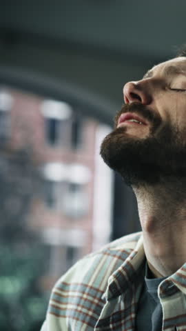 Vertical Screen: Portrait of Emotional Man Crying, Stressed, Having Mental Problems, Dealing with Death in the Family, Loneliness. Male Suffering from Depression, anxiety, other Disorders. Slow Motion Royalty-Free Stock Footage #3452878049