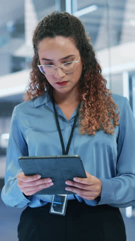 Vertical Screen: Beautiful Hispanic Female Wearing Glasses, Using Tablet Computer, Looking at Camera and Smiling. Businesswoman, Information Technology Manager, Robotics Engineering Specialist Royalty-Free Stock Footage #3453079359