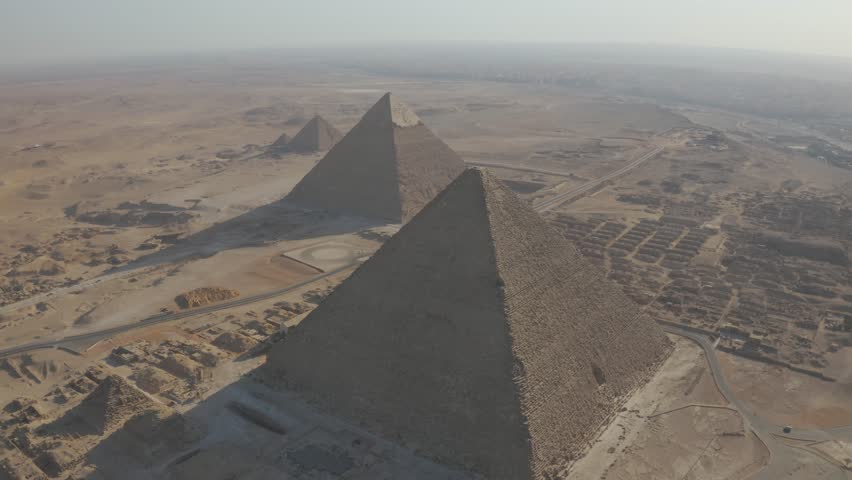 Drone of the great pyramids of giza one of the sevevn wonders of the world in Egypt Royalty-Free Stock Footage #3453249961