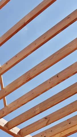 Wooden roofing rafters joist trusses at new residential house Royalty-Free Stock Footage #3453352065
