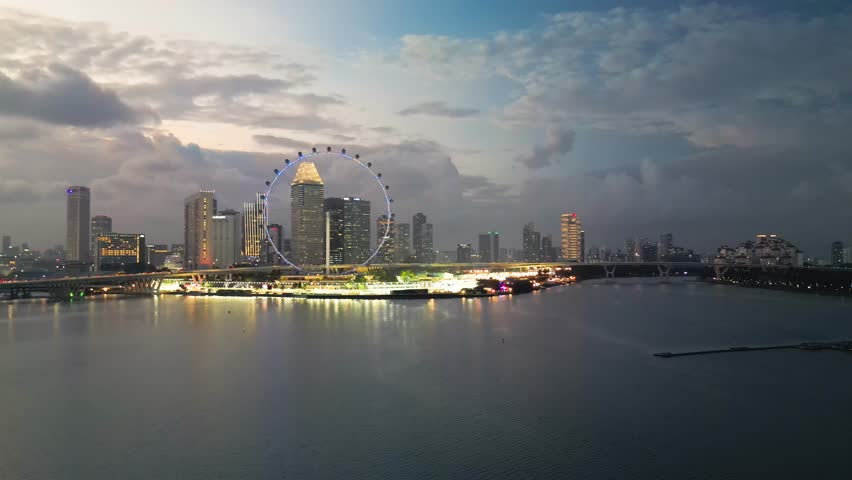 Sunset aerial view of Marina Bay and Singapore skyline