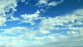 Beautiful new clouds time lapse rolling, puffy, pluffy lightness weather, best motion cloud in evening time. Full HD, 1920x1080. Seamaless  soft.