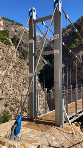 Hiking trail to Colgante bridge (Puente Colgante El Saltillo) over Almanchares river, Sierra Tejeda, Andalusia, Spain