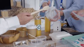 Asian business meeting showcases an eco-friendly, reusable product, reflecting a conversation on environmental protection and the development of a sustainable business model. - Powered by Shutterstock - Get 15% off with code: PIKWIZARD15