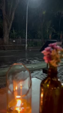 Rainning romantic with candle and flowers 