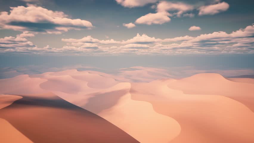 AERIAL view of epic desert landscape with, day to night Timelapse. Clouds moving fast above huge desert dunes.