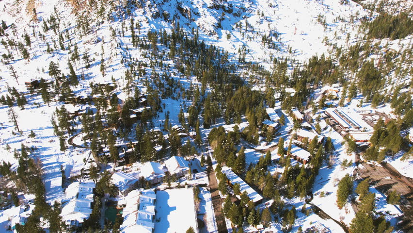 Palisades Ski Resort, Olympic Valley and Village, Lake Tahoe CA USA Drone Aerial View on Sunny Winter Day