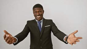 Joyful african american man in suit, standing with open arms for a warm hug. smiling at the camera, embodying cheerful happiness. isolated on a white background. - Powered by Shutterstock - Get 15% off with code: PIKWIZARD15