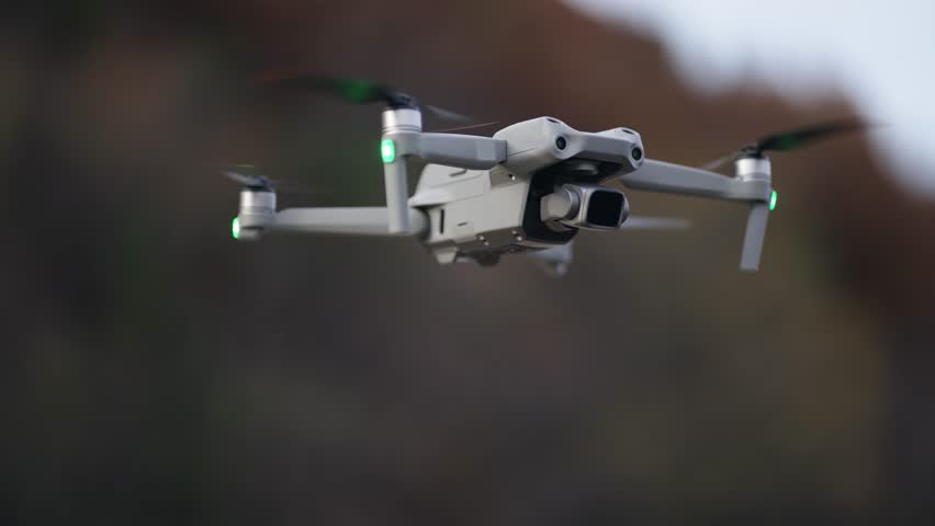 Drone hovering at sureveillance intelegence mission in slow motion