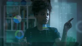 African American Business Woman Using Virtual Reality to Check 
Economic Data. Young Black Girl Using VR or Working In Augmented Reality at Workplace. Finance Holographic Animations.  - Powered by Shutterstock - Get 15% off with code: PIKWIZARD15