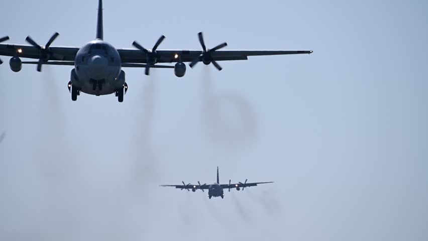C-130H military transport aircraft passing overhead (JASDF KOMAKI Airbase, 2024, Mar.) Royalty-Free Stock Footage #3454327291
